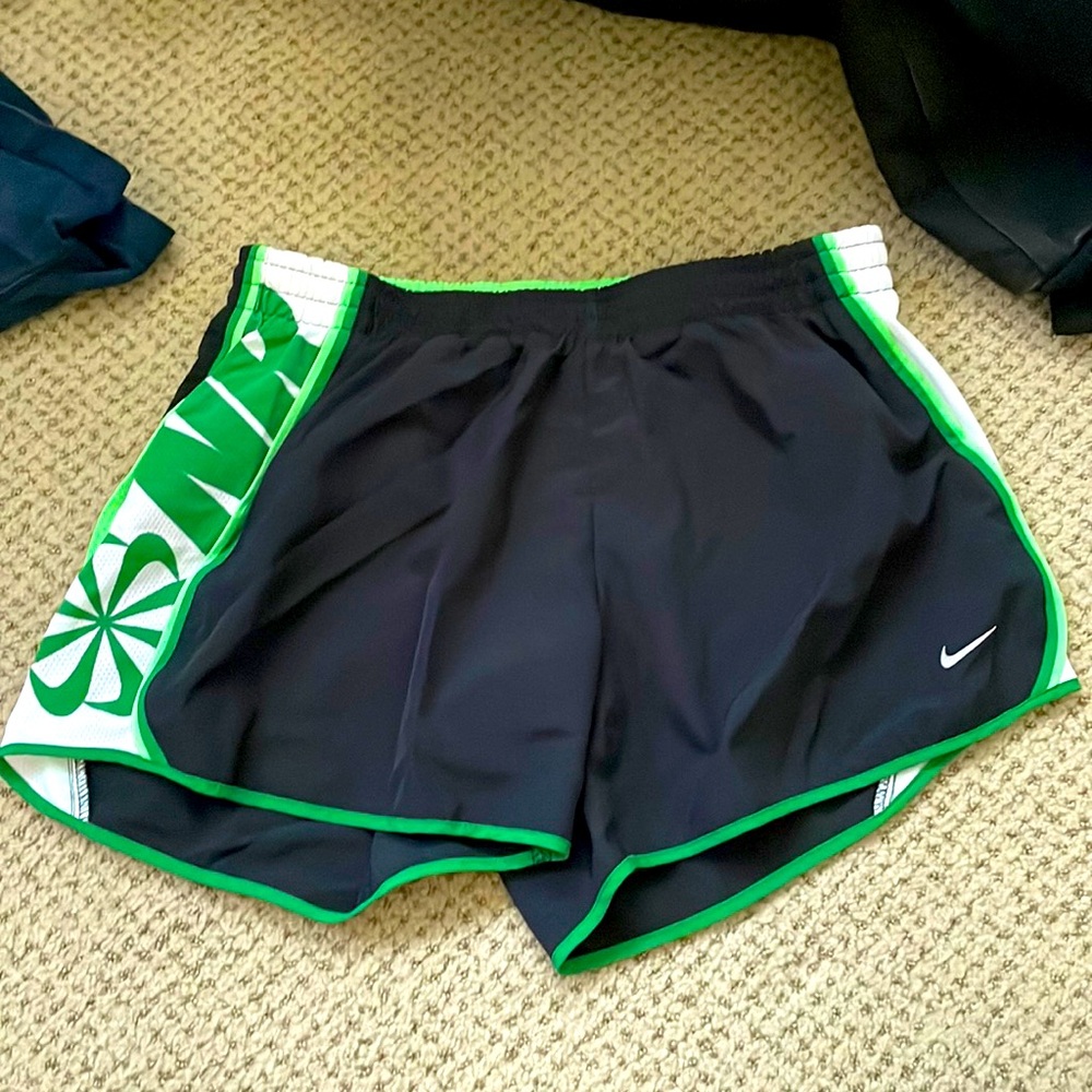 Green Nike running shorts
